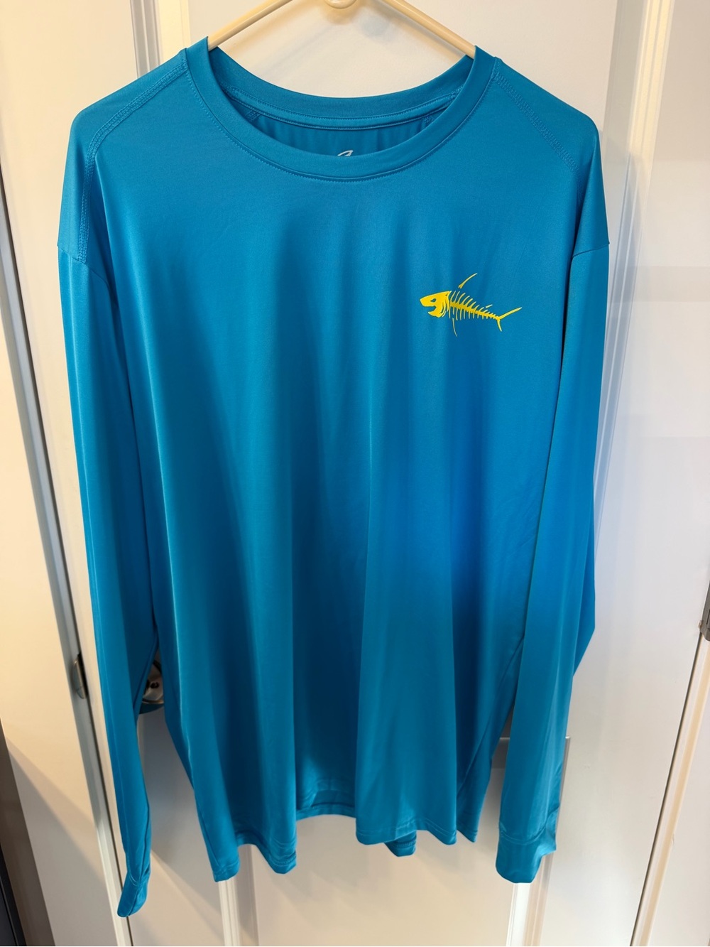 Landshark. / Margaritaville Rash Guard- Blue with Yellow Fish Logo